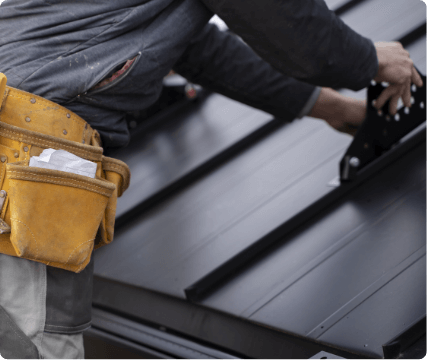 a man working on a roof